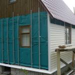 Features of repairing the external walls of a private house - from plaster to siding